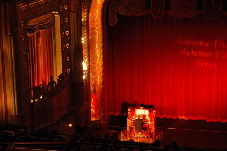Cecil Whitmire plays the Wurlitzer before a film, as seen from the balcony.